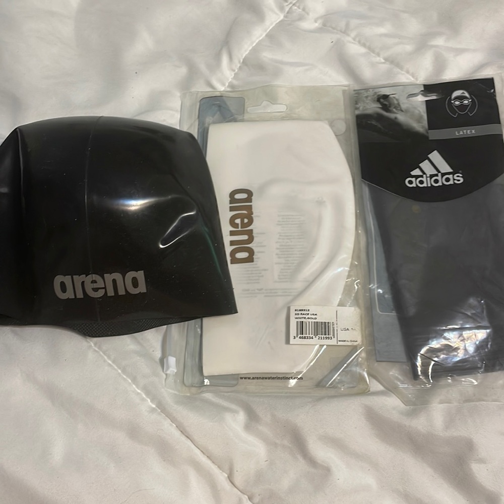 3 swim caps.